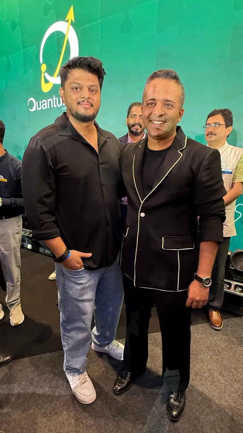 Yuvraj with Rajiv Talreja at the Quantum Leap stage at Proficorn 2026