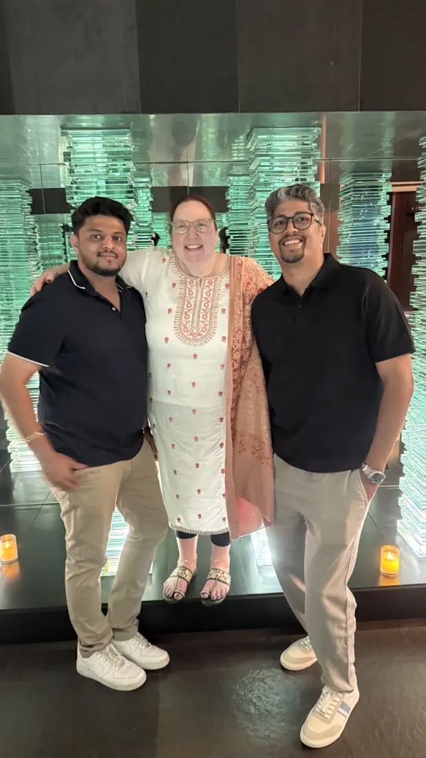 Yuvraj and a colleague with a visiting client in Pune