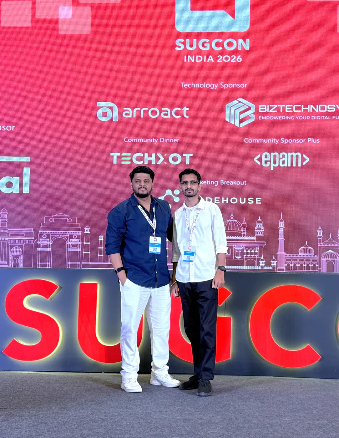 Yuvraj with a colleague in front of the SUGCON India 2026 stage